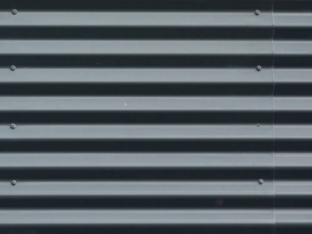 Exposed fastener corrugated metal roofing