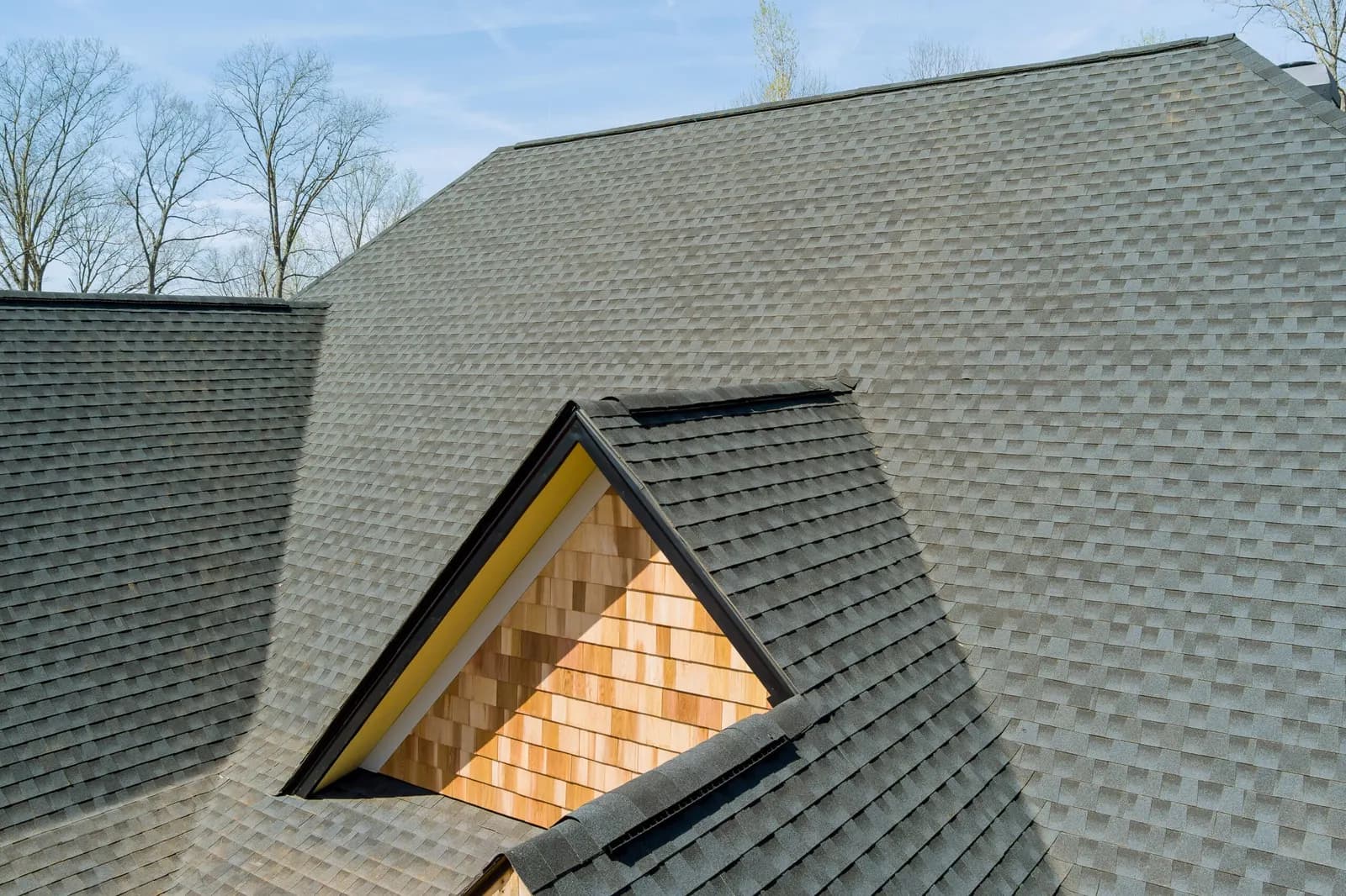 Asphalt shingles being installed by David's Roofing